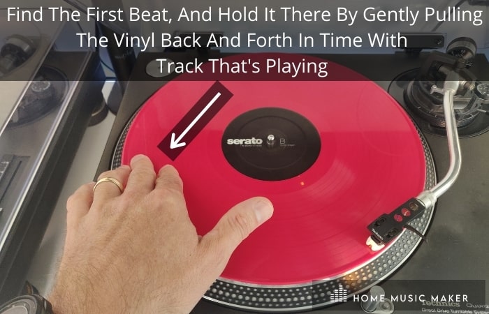 Find The First Beat, And Hold It There By Gently Pulling The Vinyl Back And Forth In Time With 
Track That's Playing 