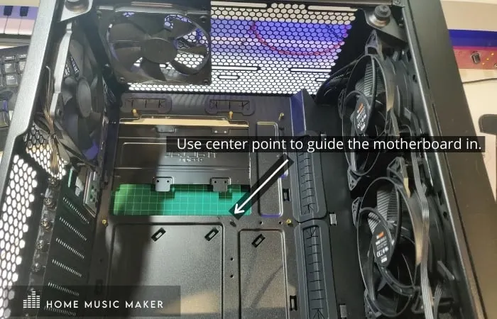 use center point to guide the motherboard in 