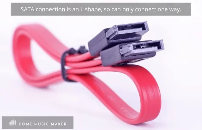 SATA connection is an L shape, so can only connect one way.
