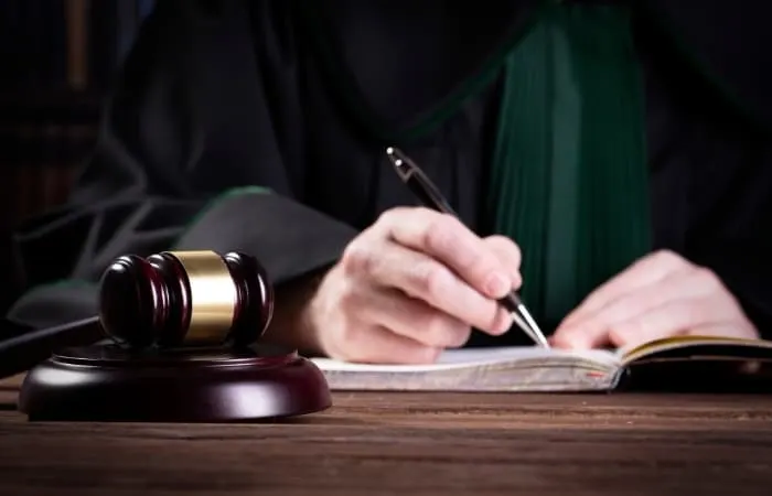 In these cases, it's up to the record label whether the producer is credited for any point during production; sometimes, labels will decide against crediting someone because doing so could lead to legal implications further down the road over royalties, etc.
