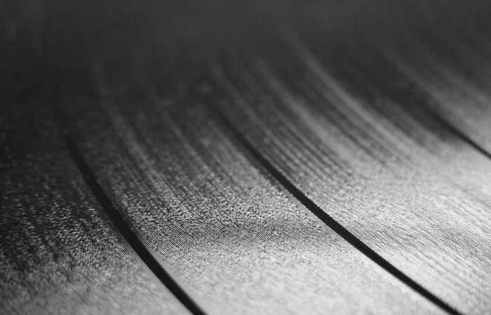 Vinyl Song Structure - if you look closely at the piece of vinyl, you will be able to see the song's structure from the grooves. 