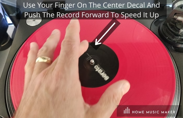 Get In The Mix - use your finger on the center decal and push the record forward to speed it up