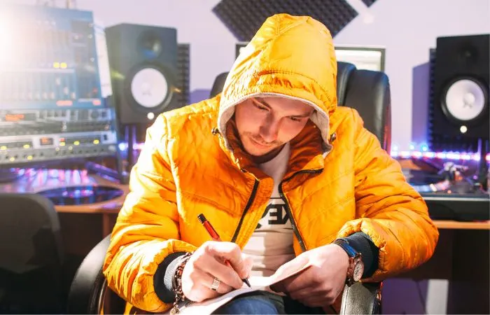 Rapper writing lyrics