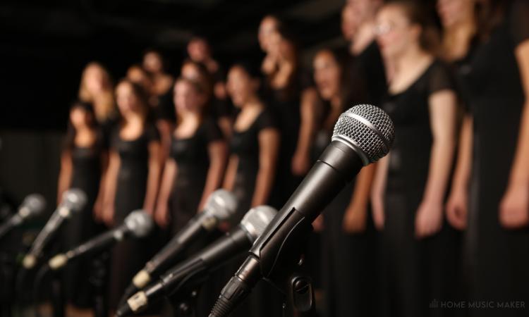 Choir Performing in front of a microphone