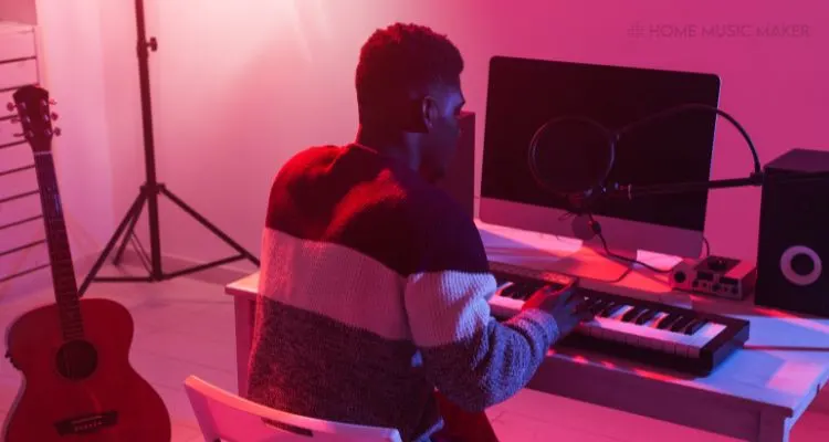 Man In A Studio Playing Keyboard